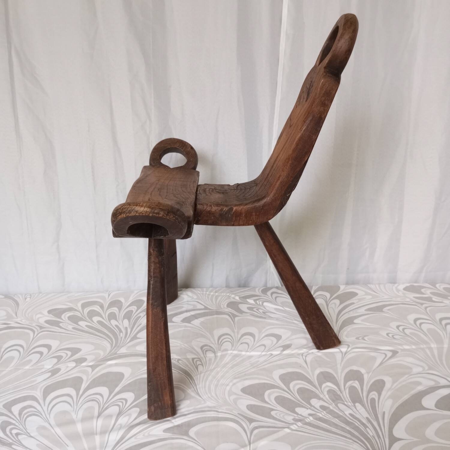 Brutalist tripod chairs in solid wood