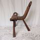 Brutalist tripod chairs in solid wood