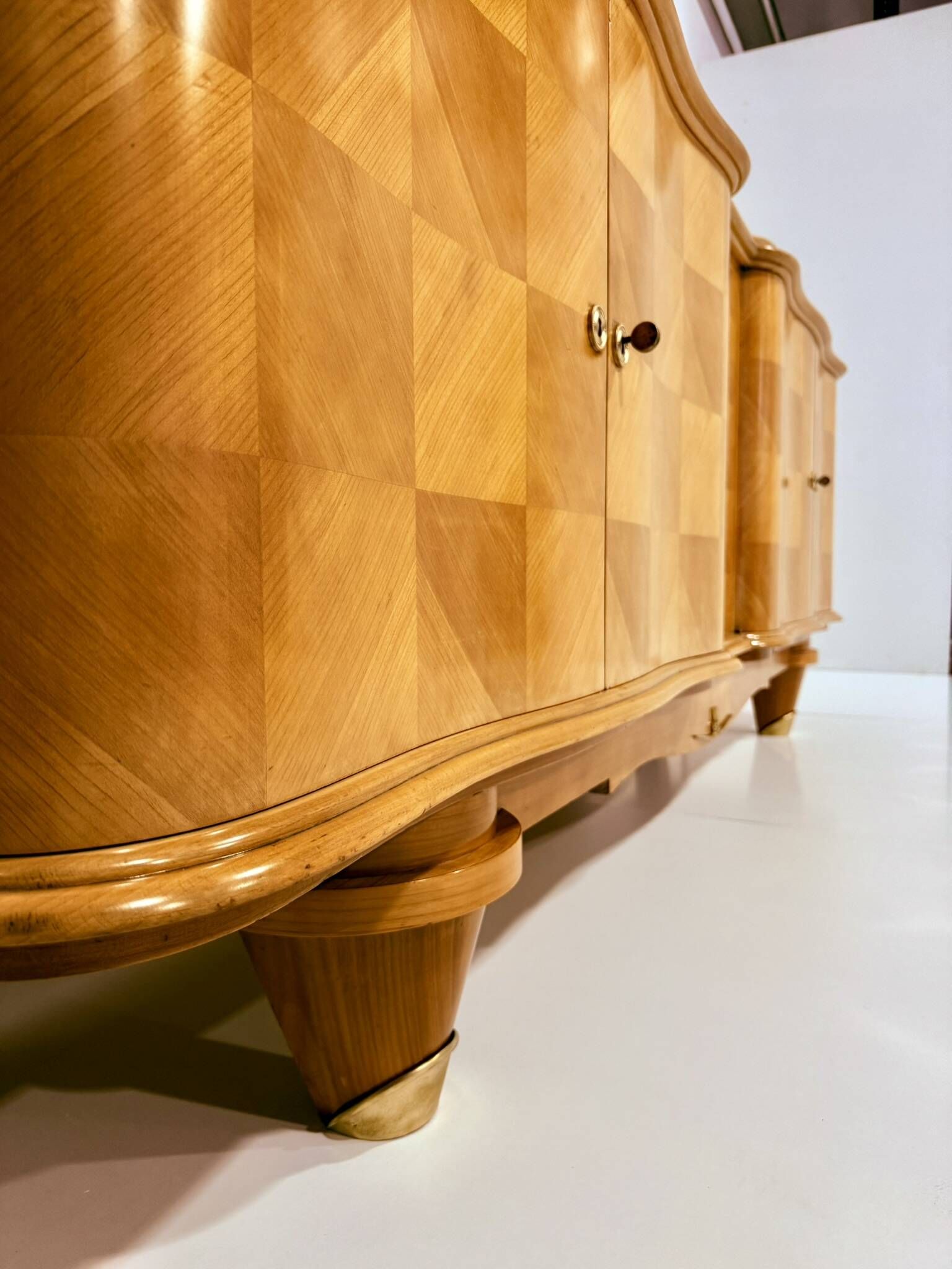Dining room suite in sycamore, French Art Deco in the style of André Arbus, circa 1940.