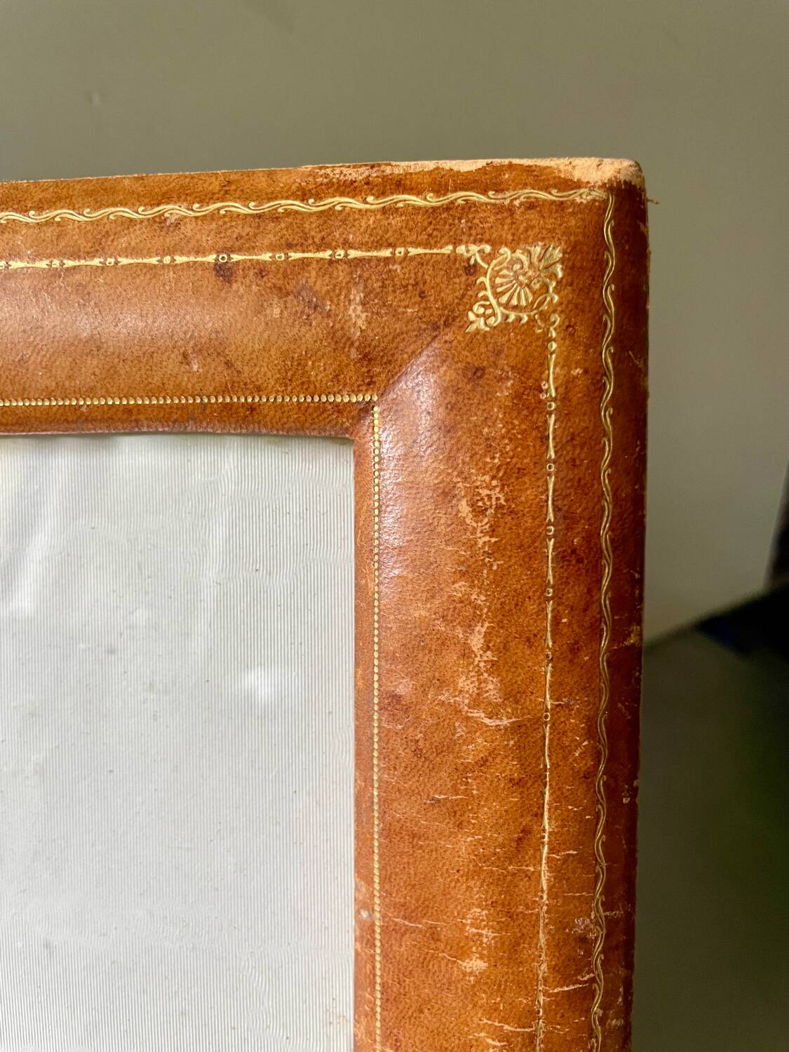Antique  leather  with gilding frame measurements 31 cm x 25 cm