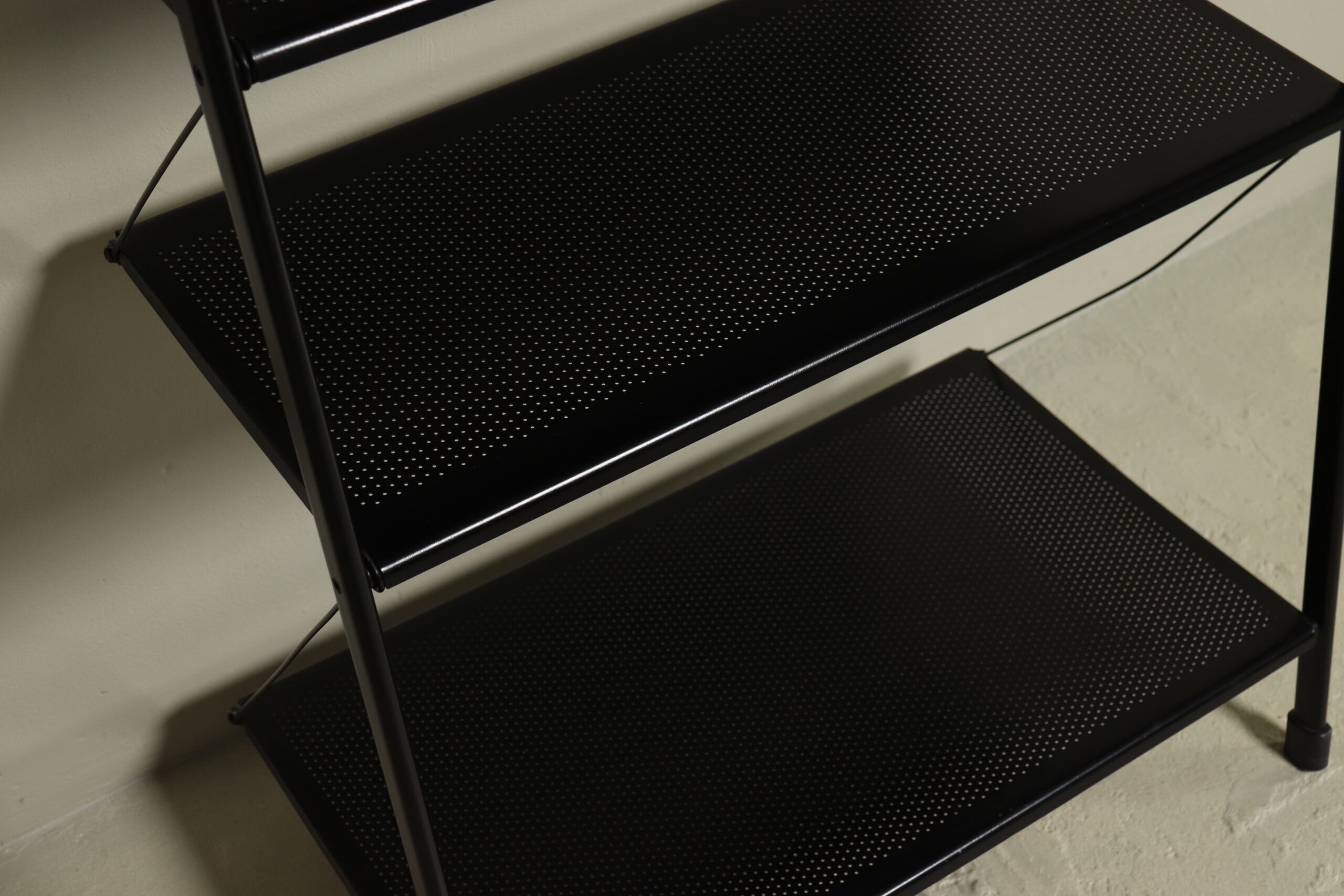 Postmodern freestanding perforated steel shelving unit 1980s