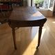 Foldable wooden round table