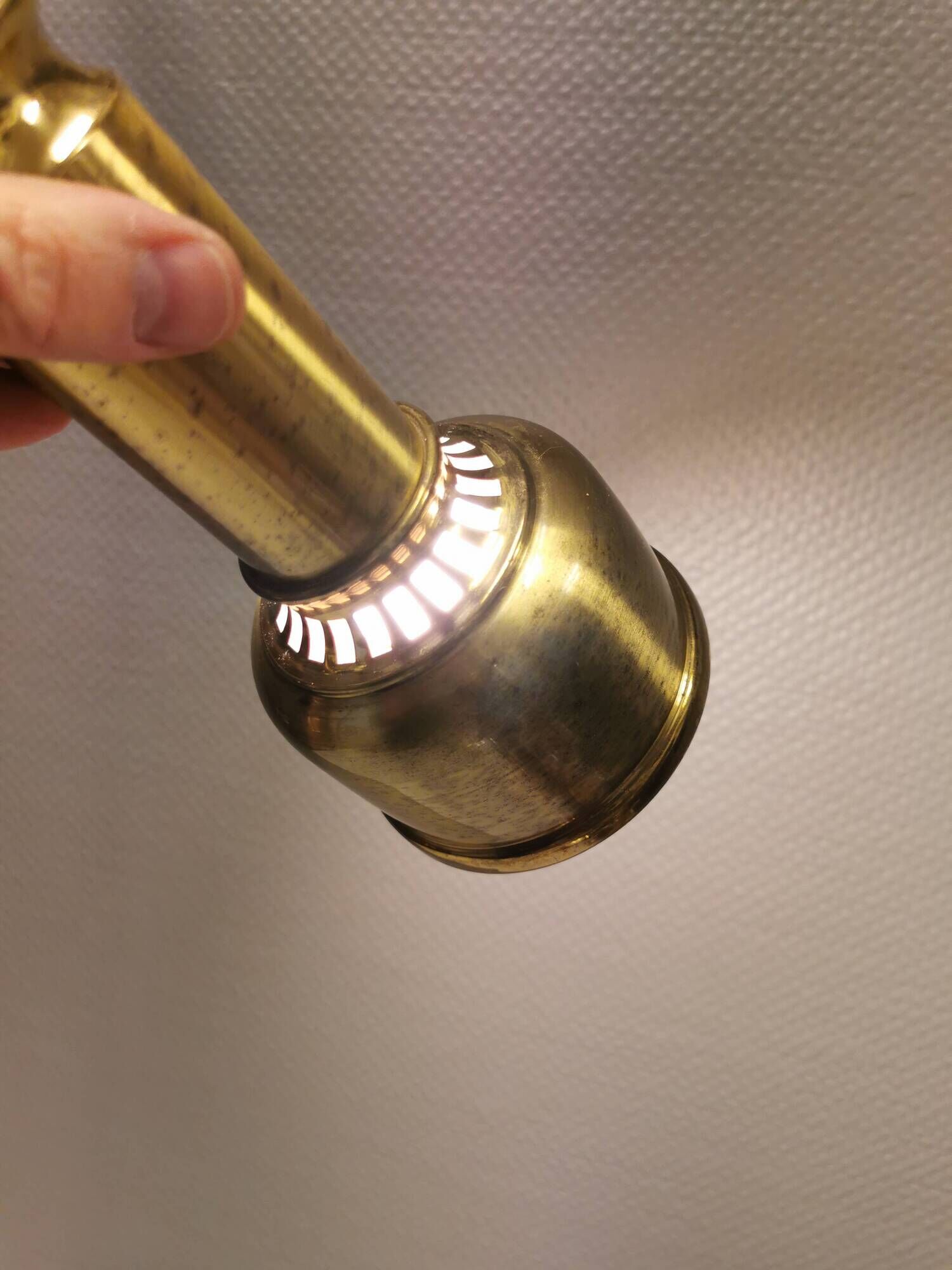 Two beautiful perforated brass hanging lamps, Danish and from the 1980s.