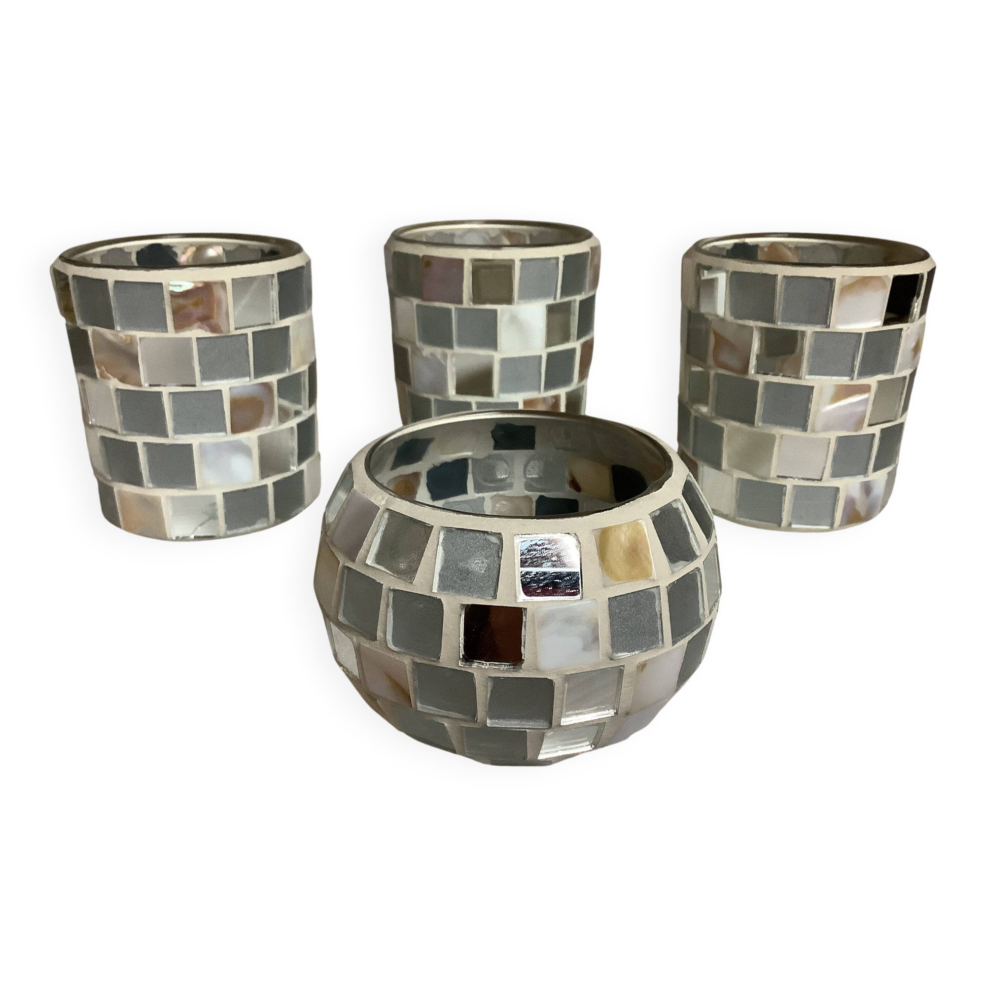 Four mosaic mirror and mother-of-pearl candle holders.