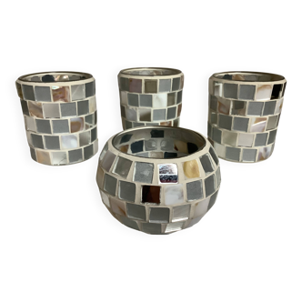 Four mosaic mirror and mother-of-pearl candle holders.