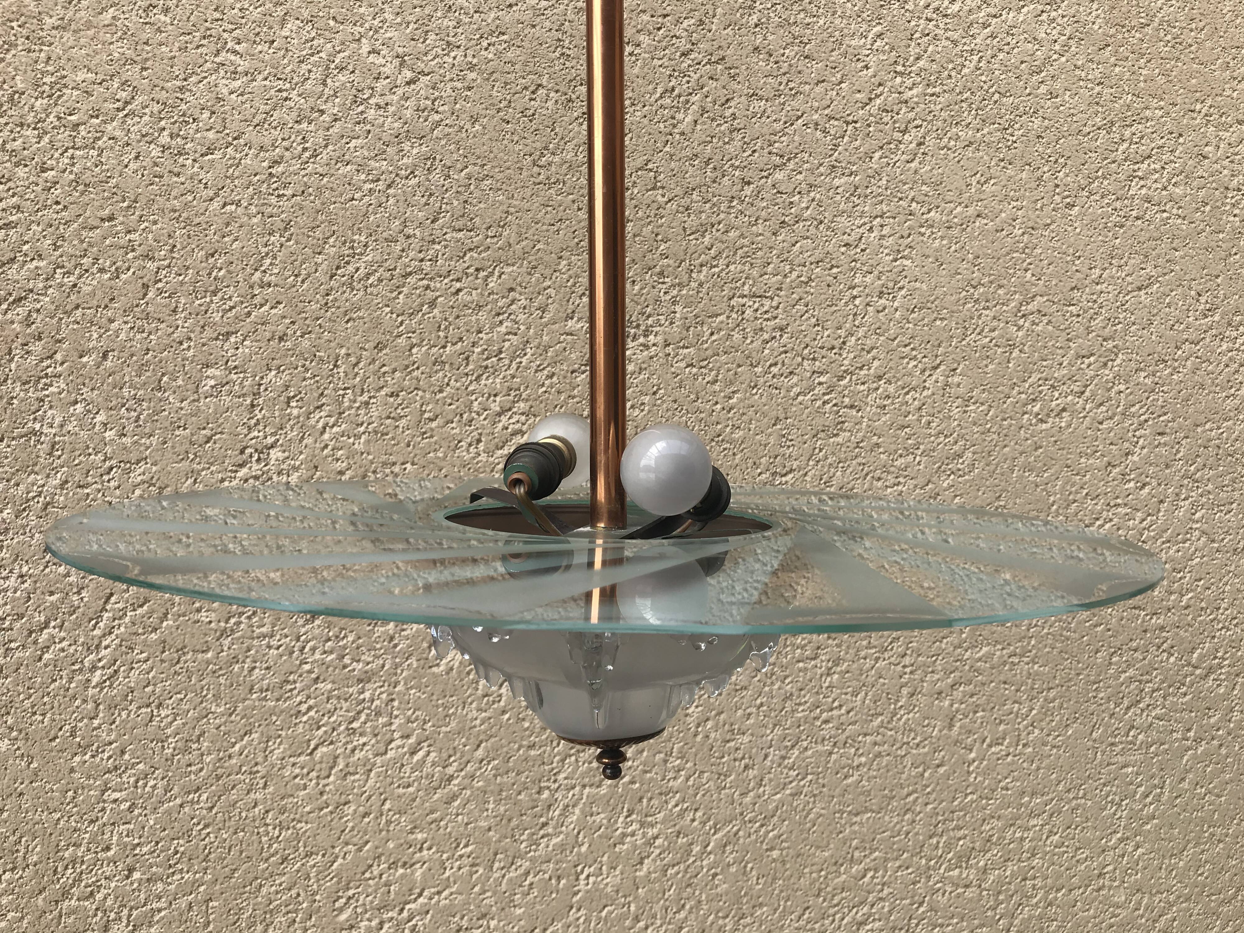 Copper and glass hanging lamp with his Ezan glass disc