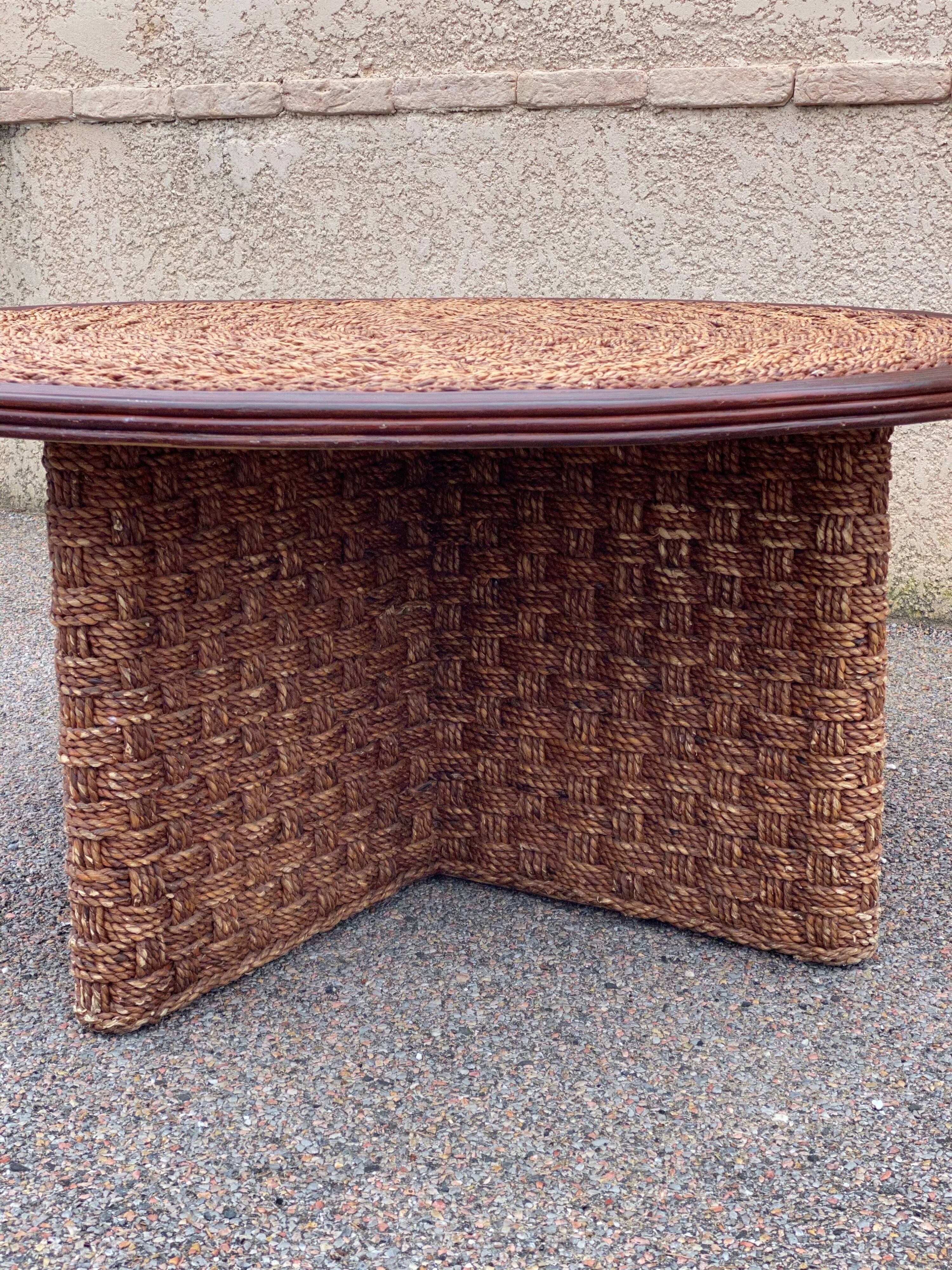 A coffee table and four rope stools 1960/1970