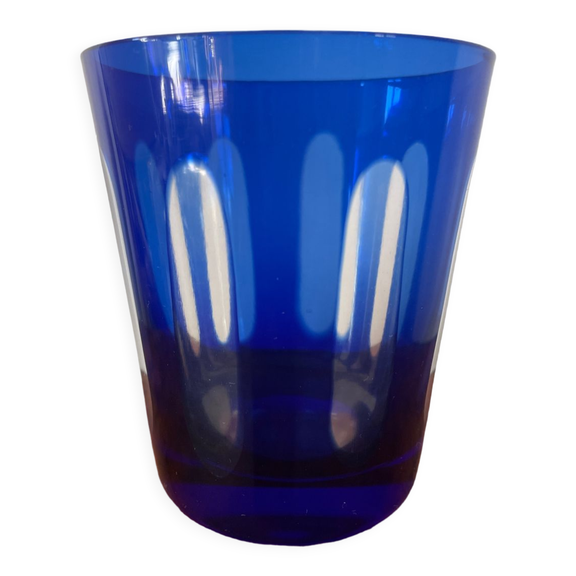 Antique crystal glass lined blue.