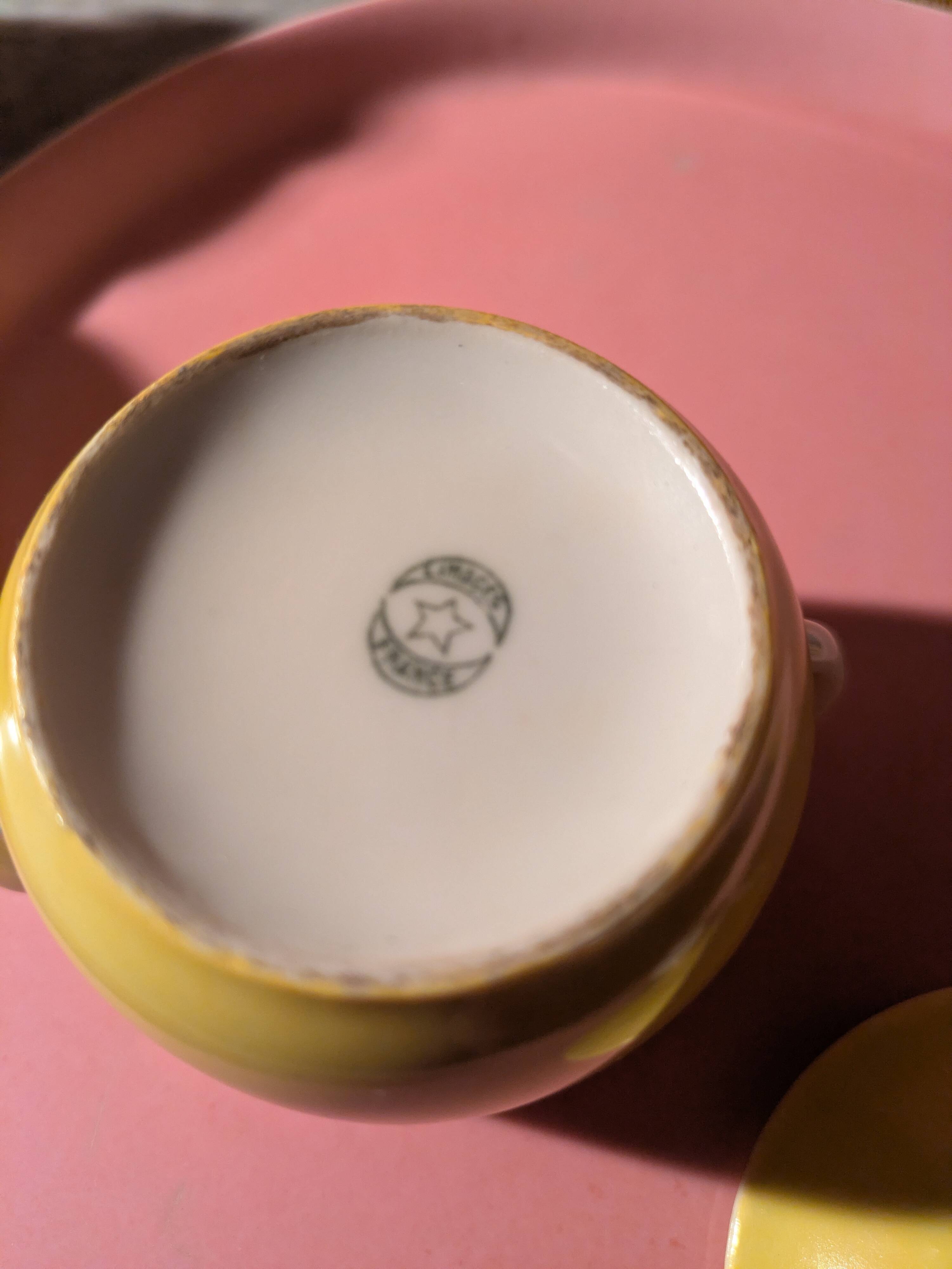 6 small porcelain cream pots from Limoges with a tray.