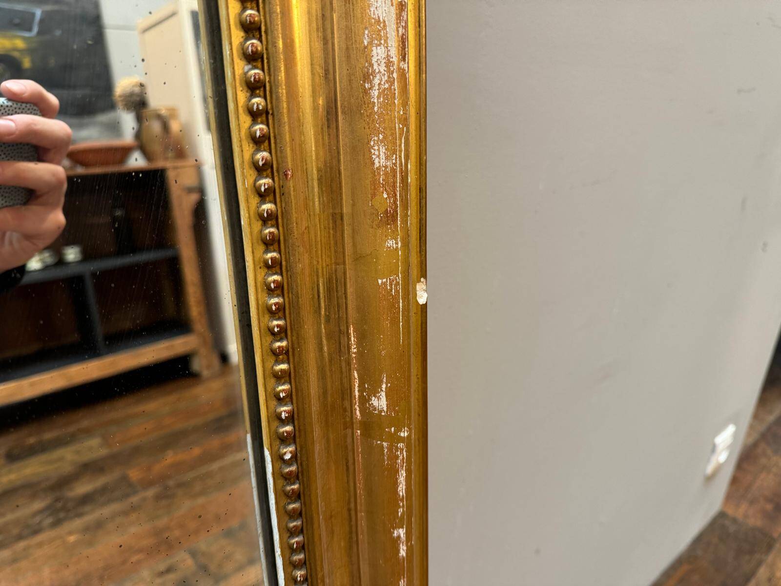 Antique gilded fireplace mirror