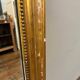 Antique gilded fireplace mirror