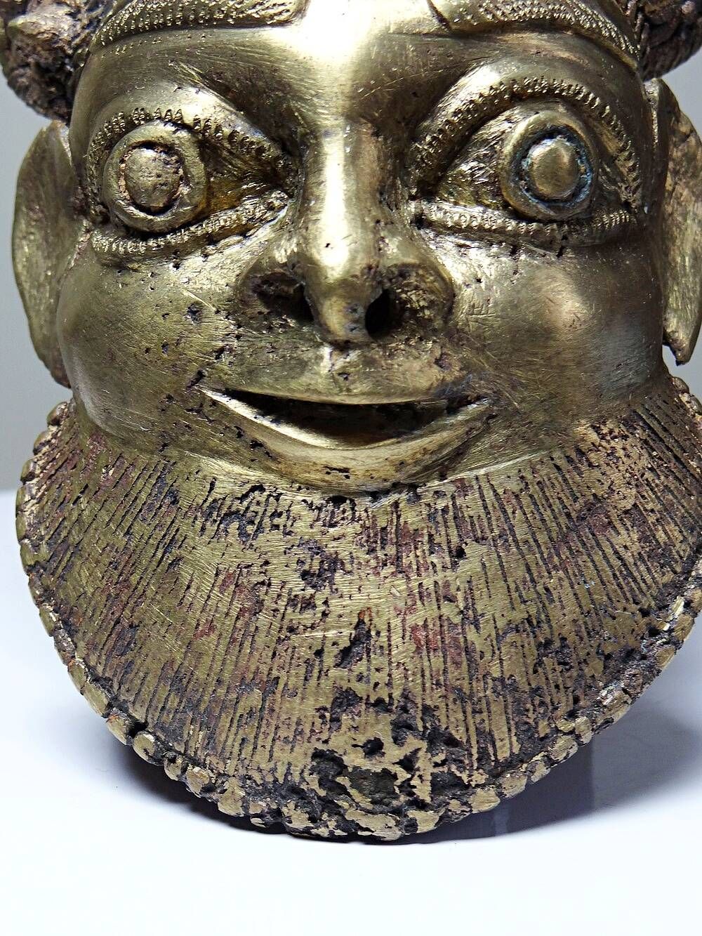 Small gilded bronze Oba mask from Bamoun, Cameroon, vintage Africa