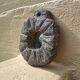 Brutalist mirror in hand-carved natural stone