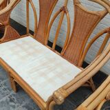 Set of 2 rattan armchairs with a bench.