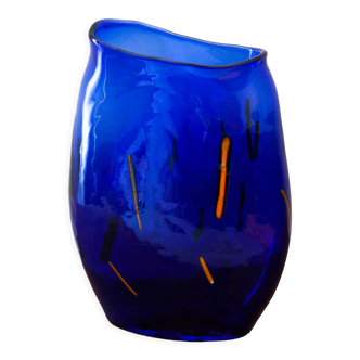 Blue blown glass vase and orange inclusion
