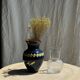 Ribbed glass ball vase