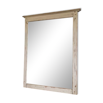 Beveled mirror patinated wood frame