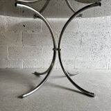 Oval table in smoked glass and chrome steel