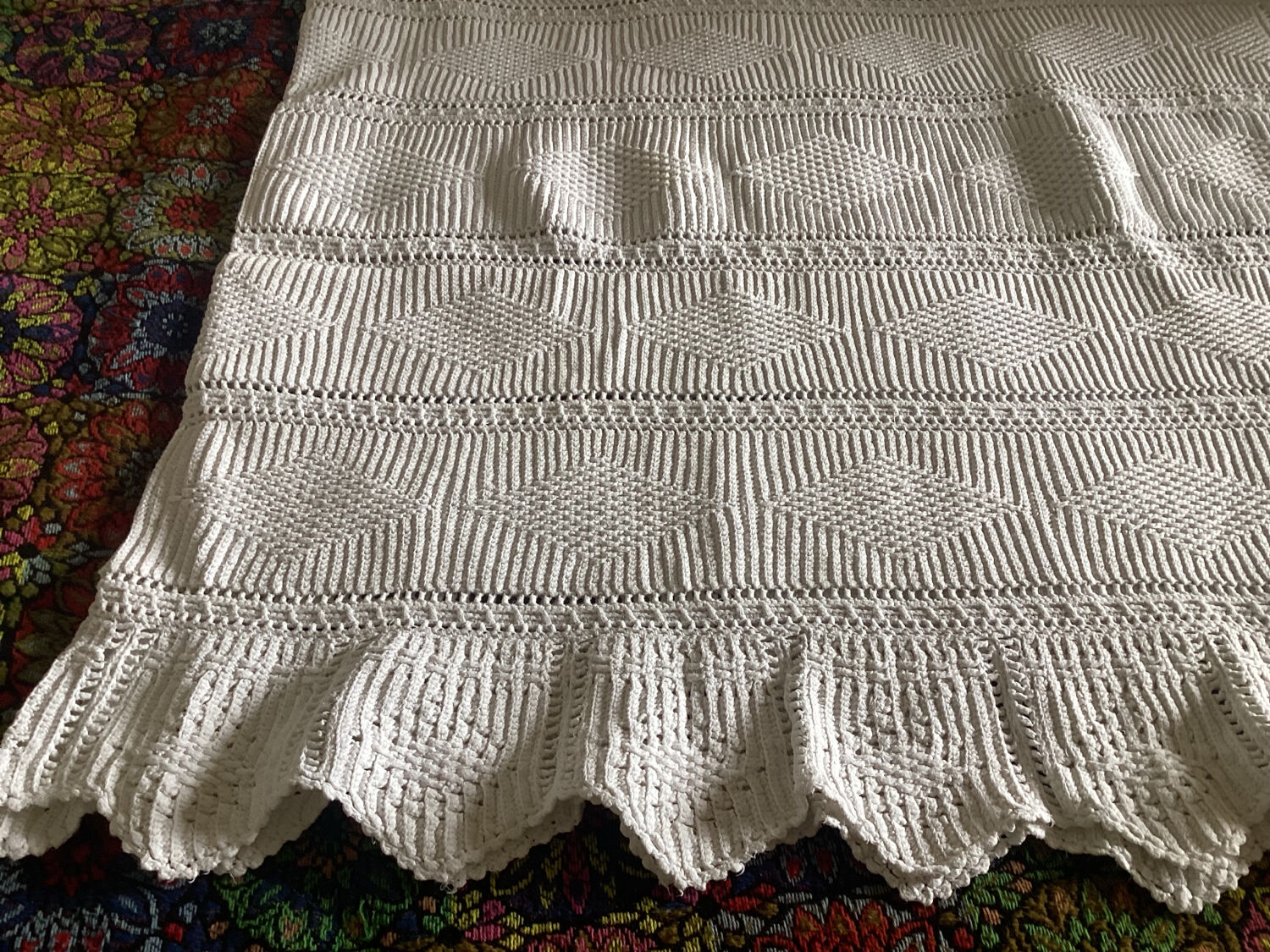 White cotton crochet bed cover with diamond bands
