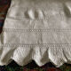 White cotton crochet bed cover with diamond bands