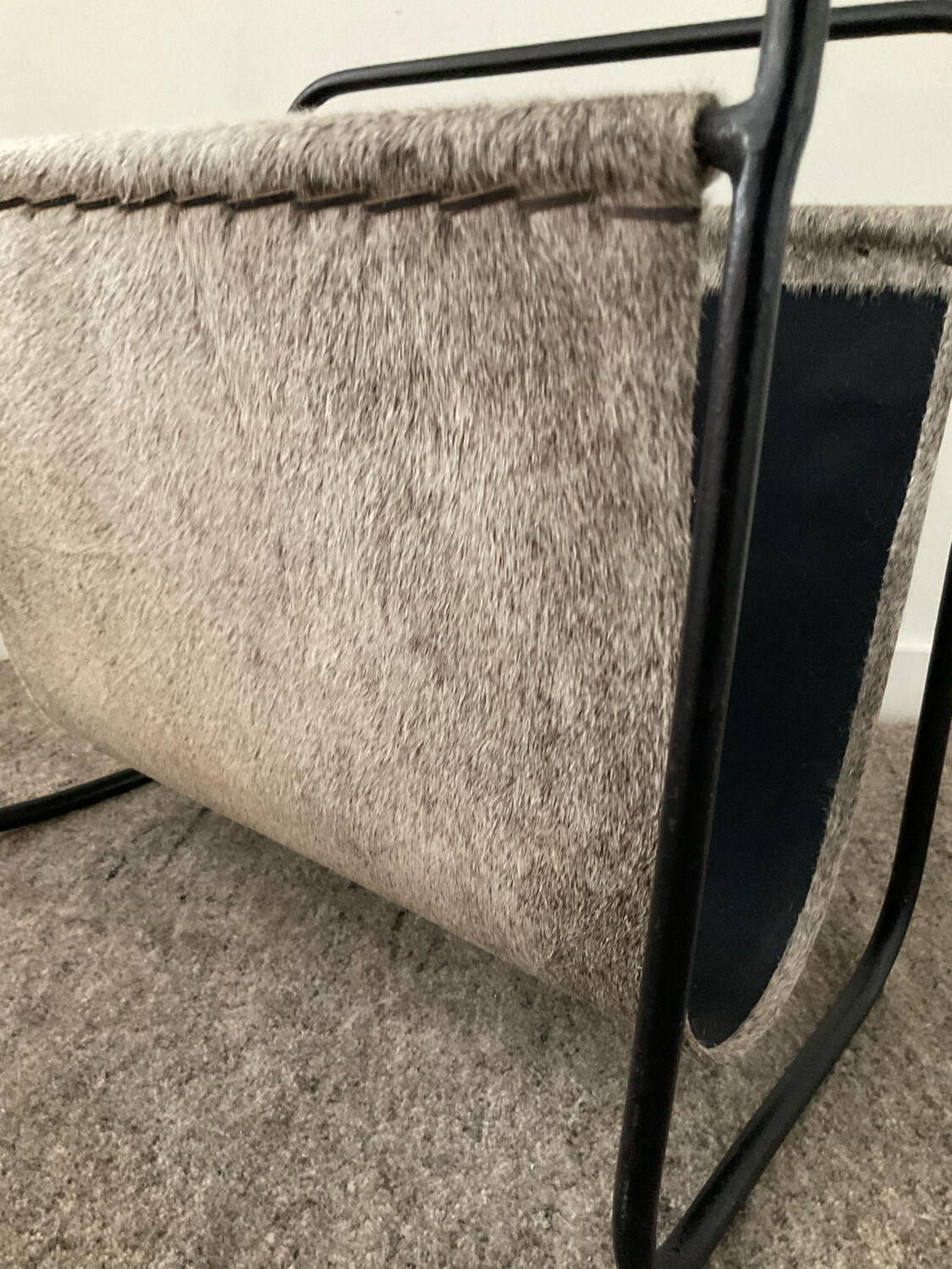 Vintage magazine holder in metal and leather