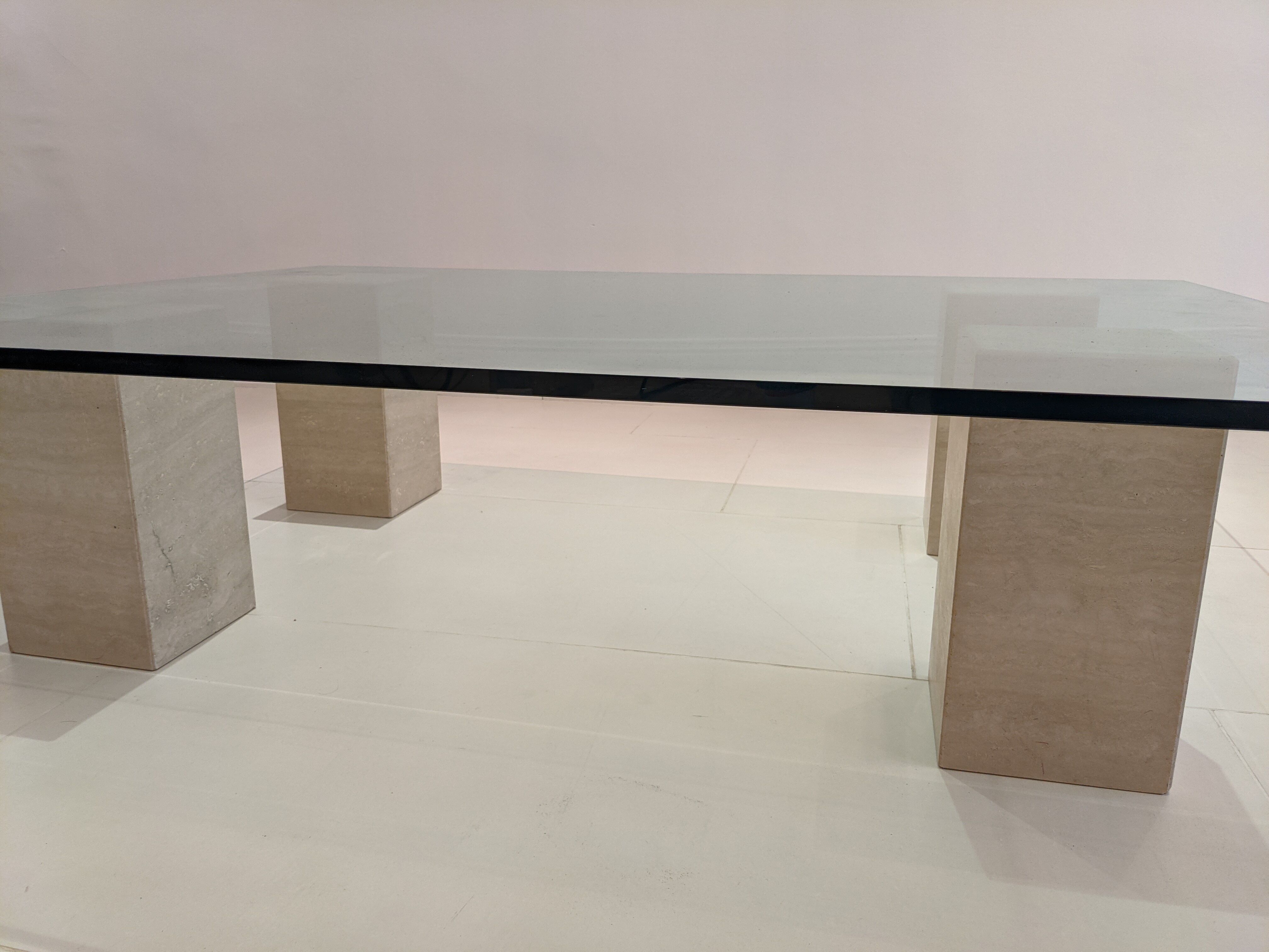 Glass table and travertine feet