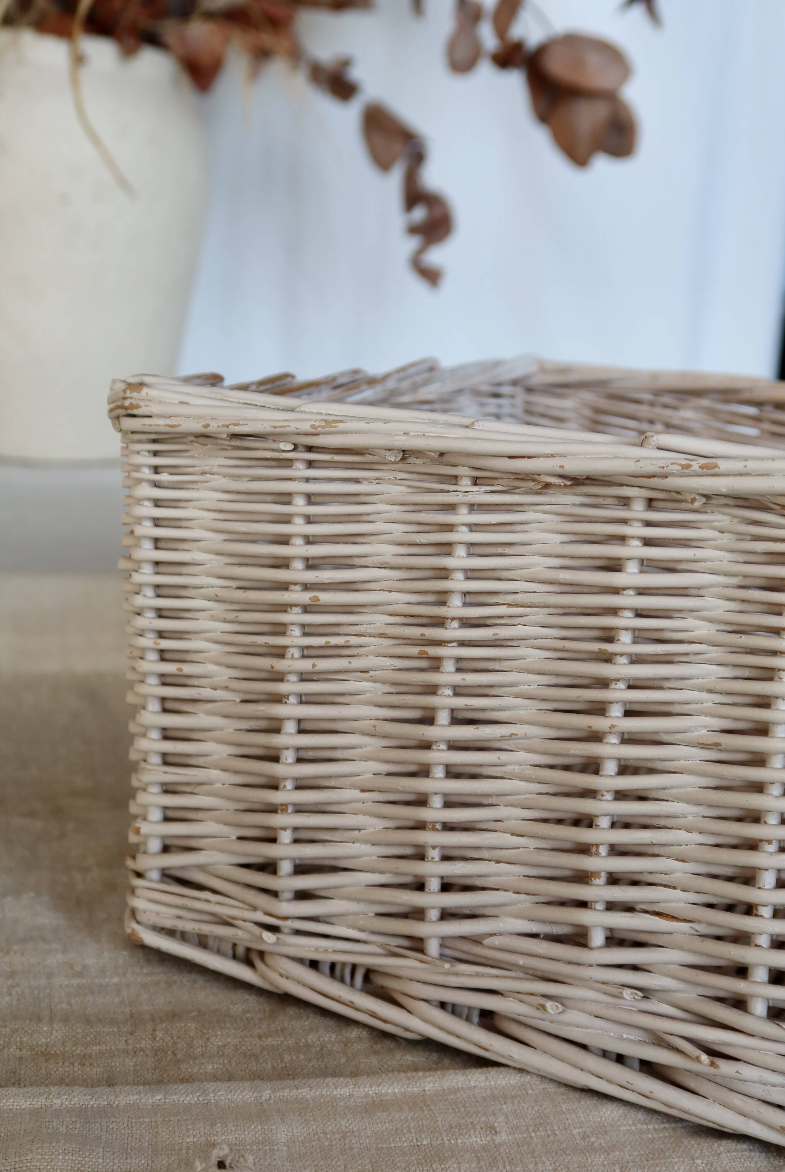Vintage white wicker storage baskets