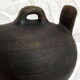Pourer, terracotta teapot. Hen.