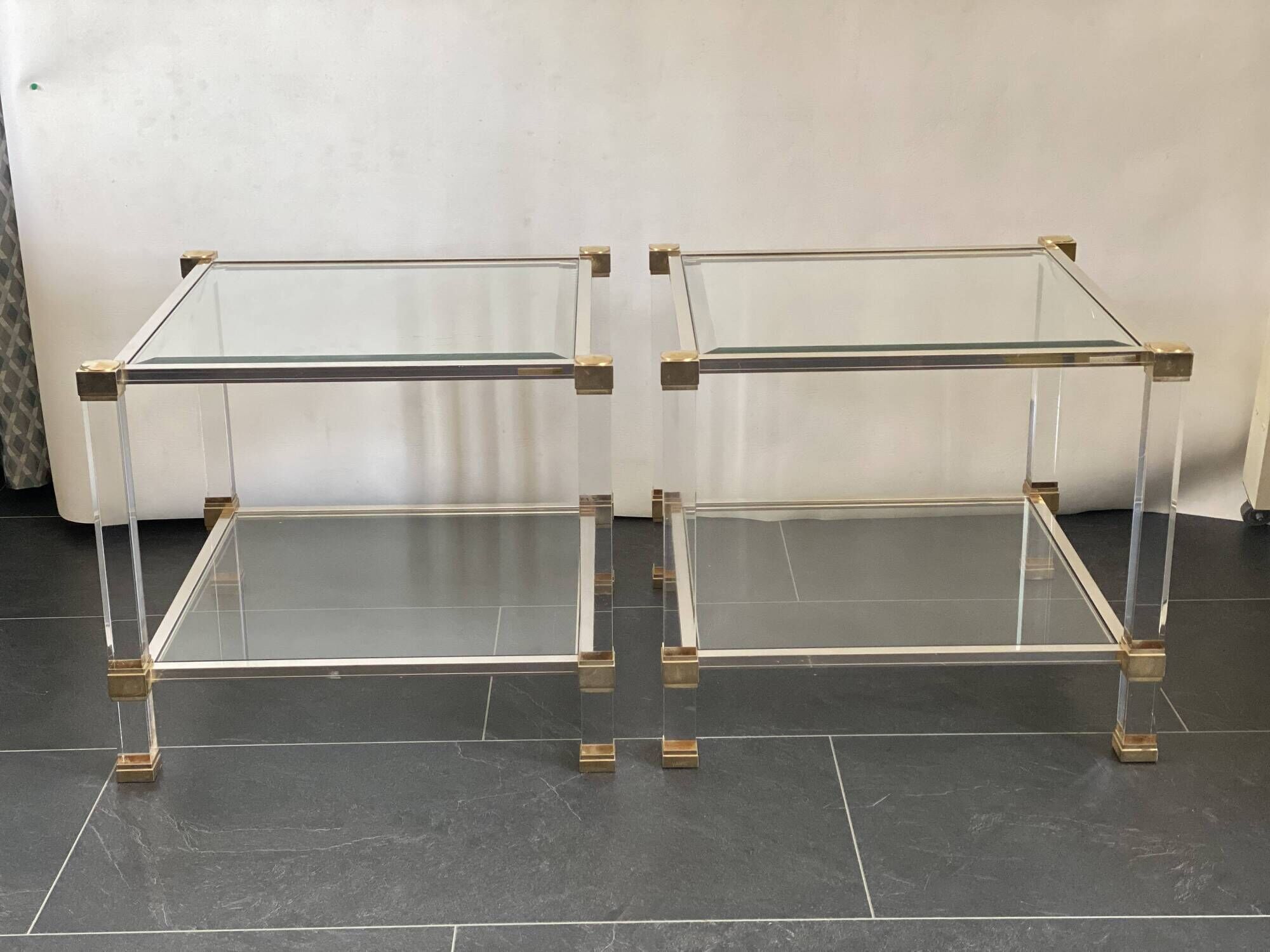 Pair of vintage and brass glass hollywood regency side tables by peter vandel