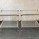 Pair of vintage and brass glass hollywood regency side tables by peter vandel