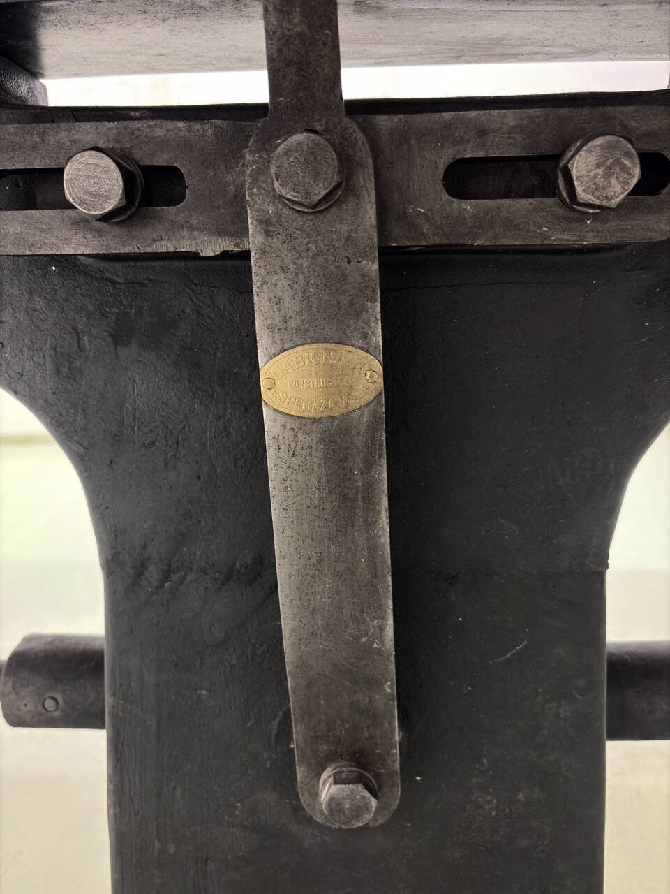 Industrial table with cast iron legs.