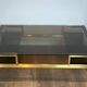 Modernist coffee table in brass and smoked glass tops by Guy Lefèvre for Maison Jansen.
