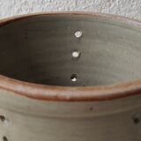 Pot with pheasant in earth