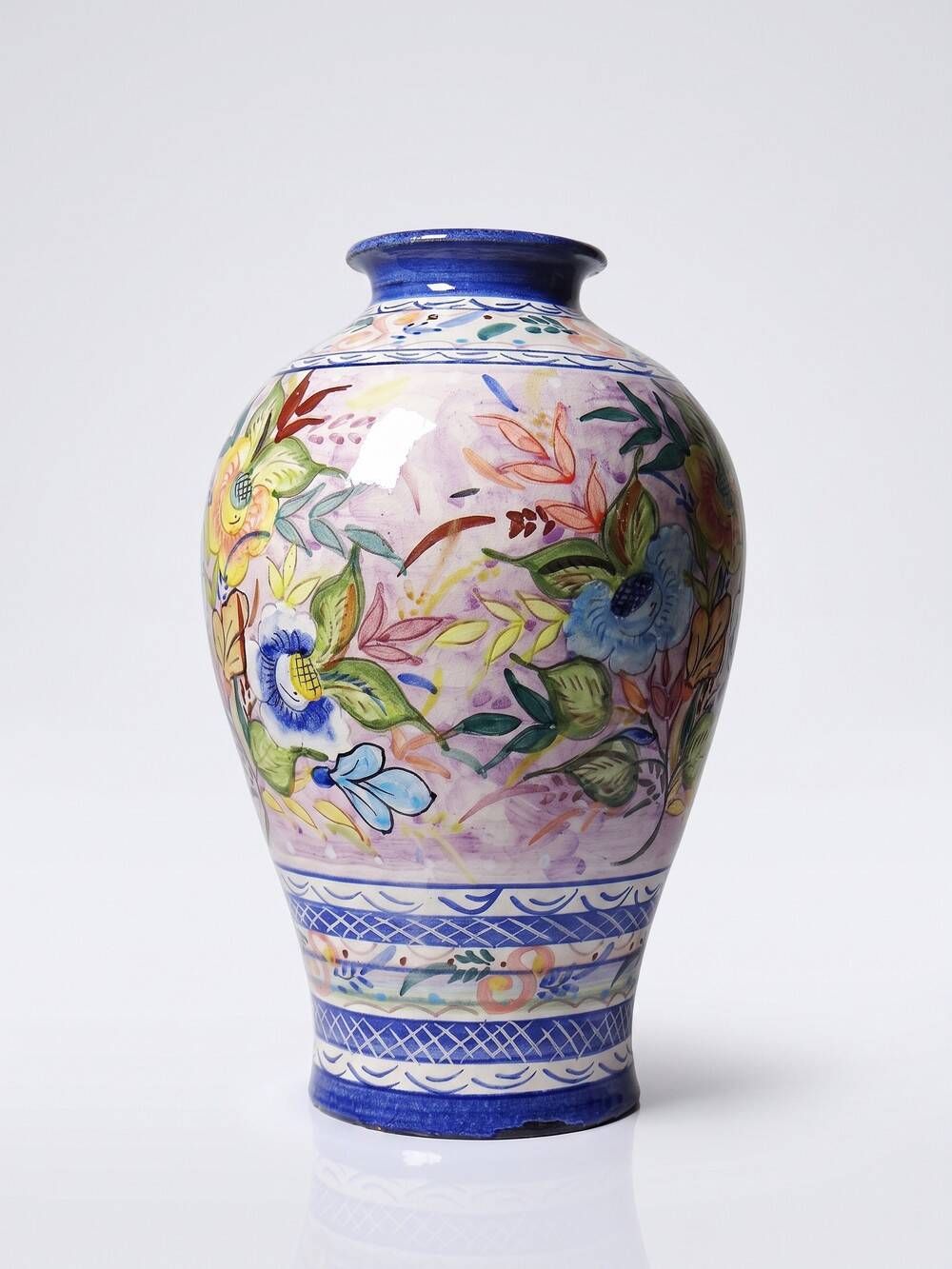Vintage Portuguese vase in glazed terracotta with hand-painted floral decoration.