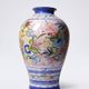 Vintage Portuguese vase in glazed terracotta with hand-painted floral decoration.