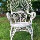 Fauteuil rotin peacock années 60