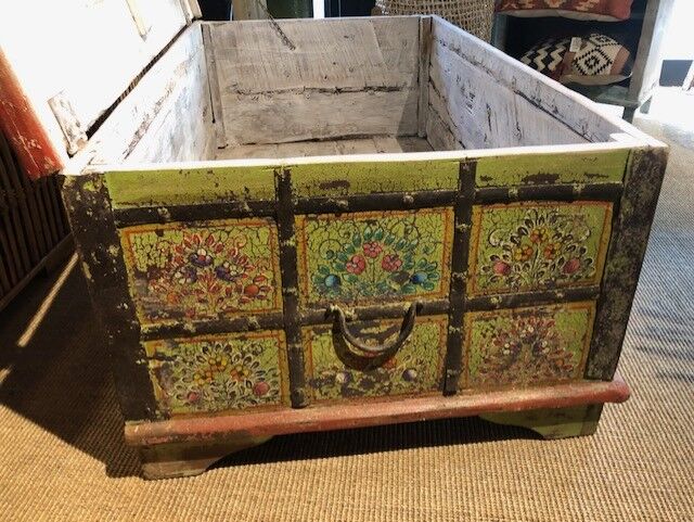 Coffee table chest painted with patterns
