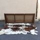 Cane-seated teak bench