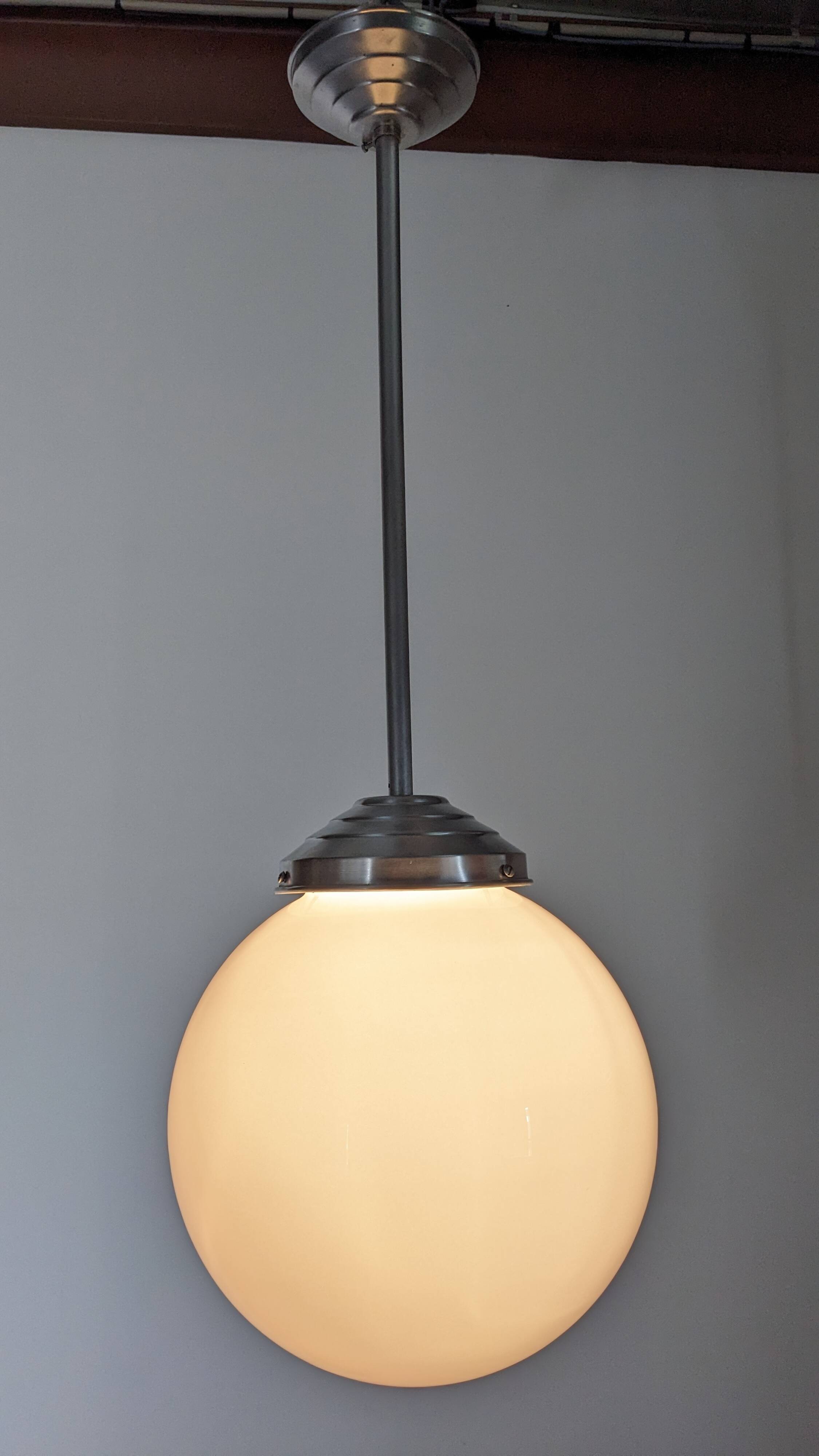 XL Art Deco white opaline suspension light, France circa 1920.