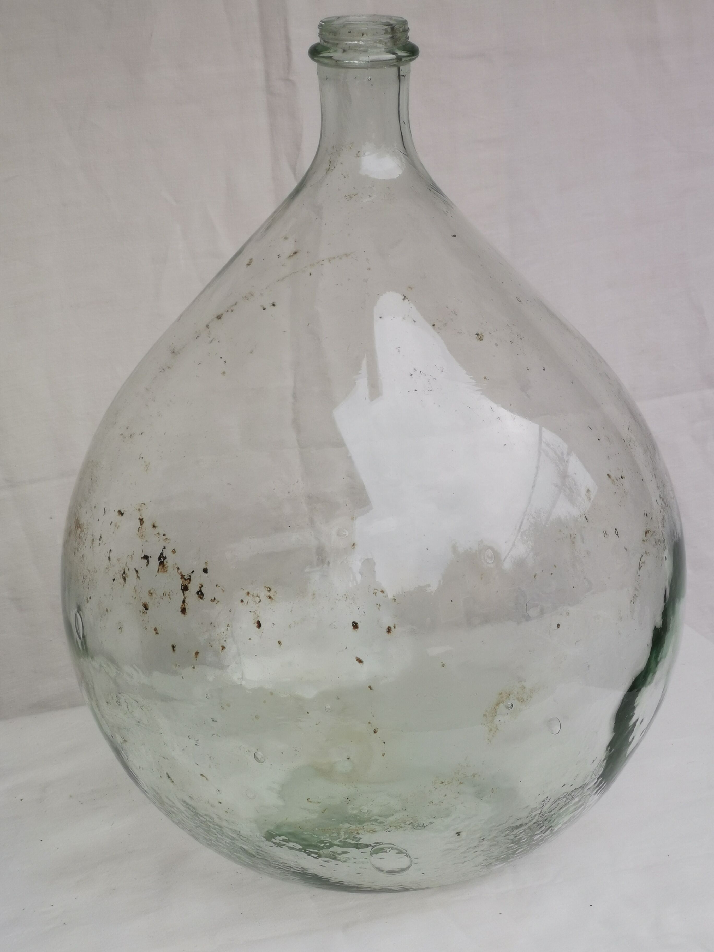 Large old lady Jeanne in transparent glass