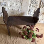 Small brutalist wooden bench
