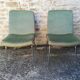 Shell chairs and green fabric