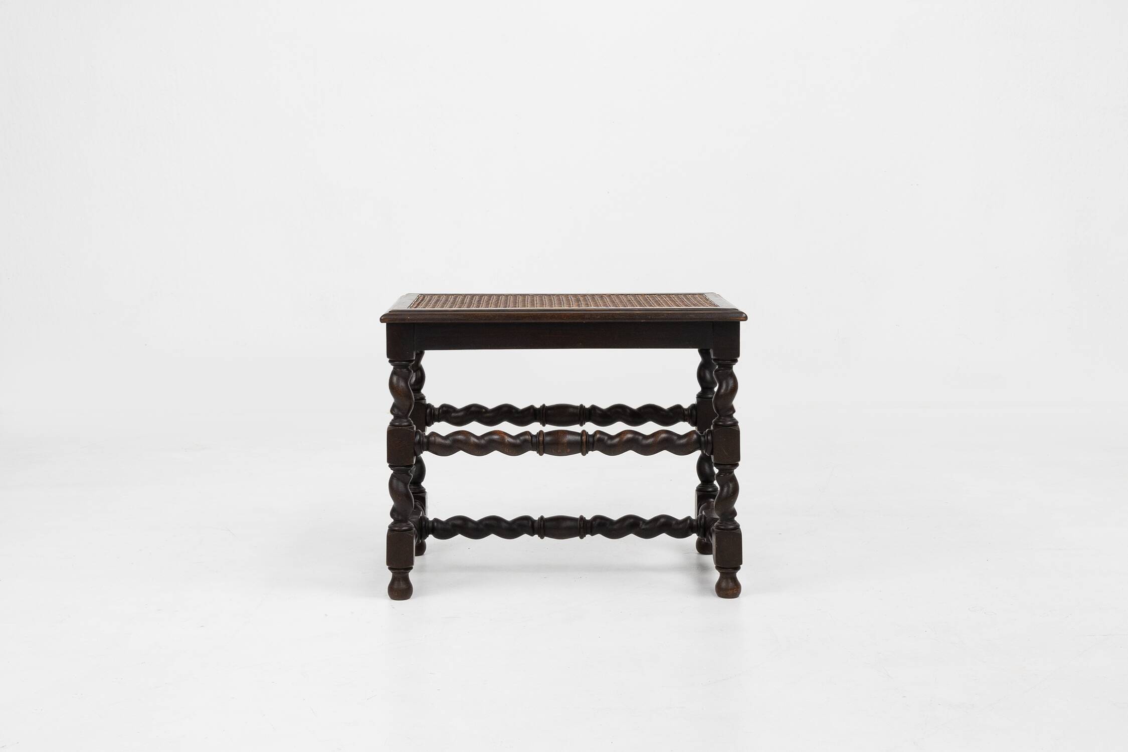 Antique French wooden stool with rattan top, ca. 1880