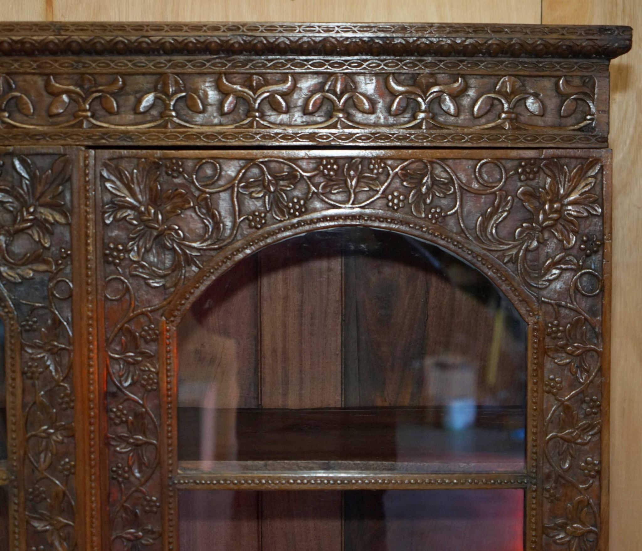19th-century Anglo-Indian colonial hardwood library on a chest of drawers.