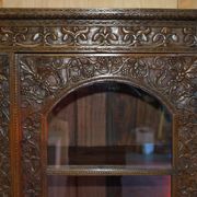 19th-century Anglo-Indian colonial hardwood library on a chest of drawers.