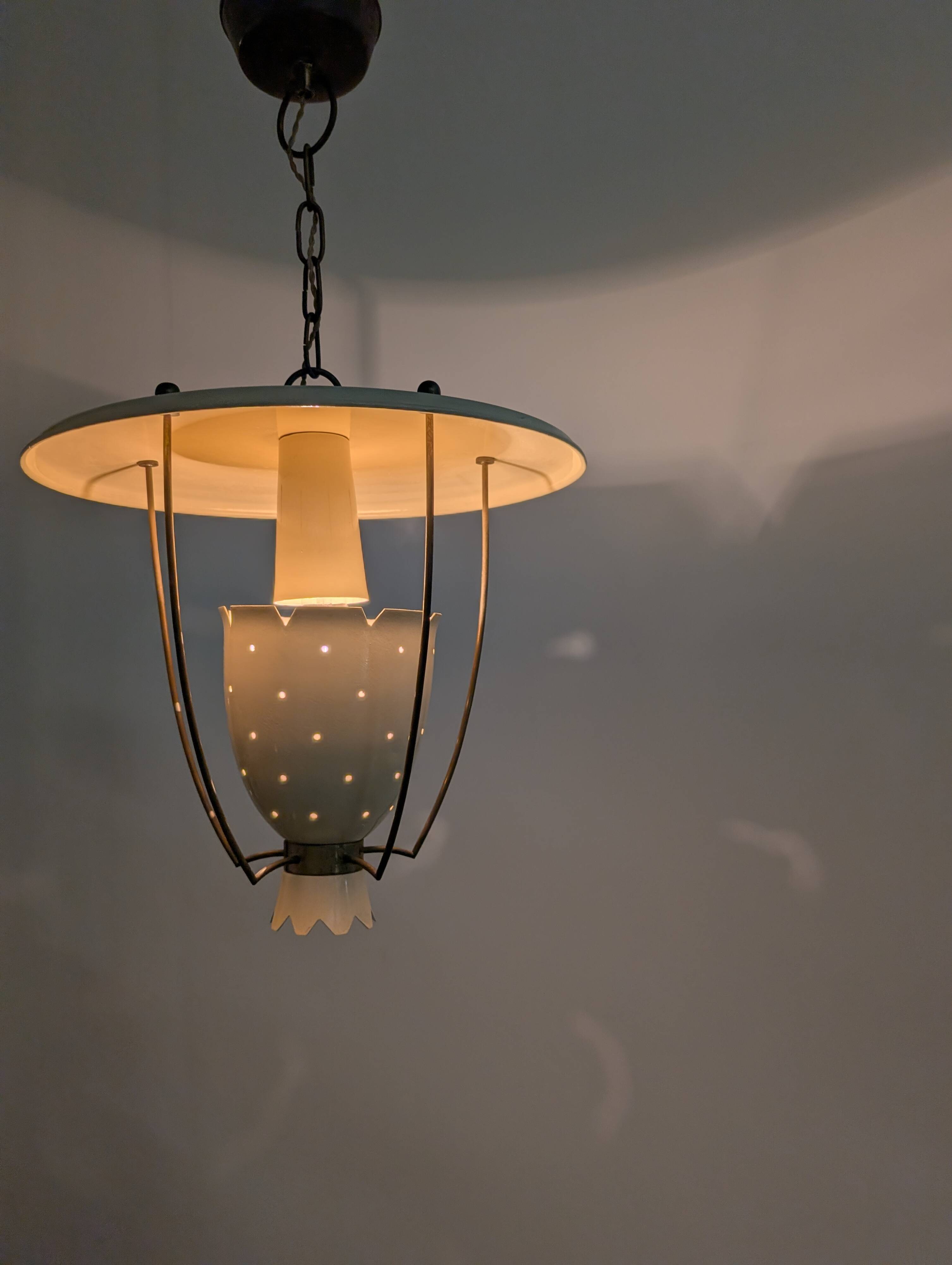 Perforated metal pendant lamp with brass details, Italy, 1940s