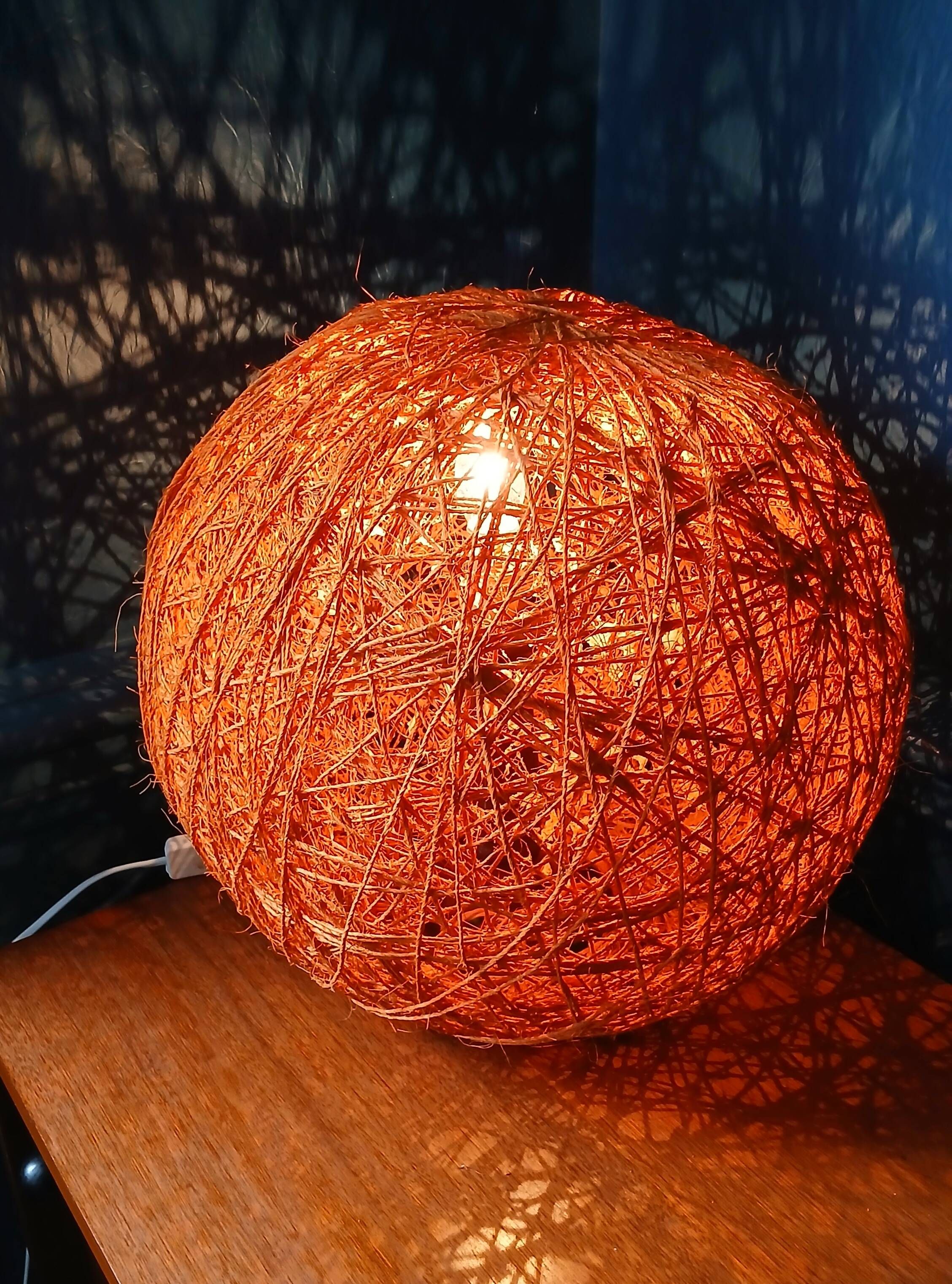 Orange lampshade in cord and rattan from the 1970s