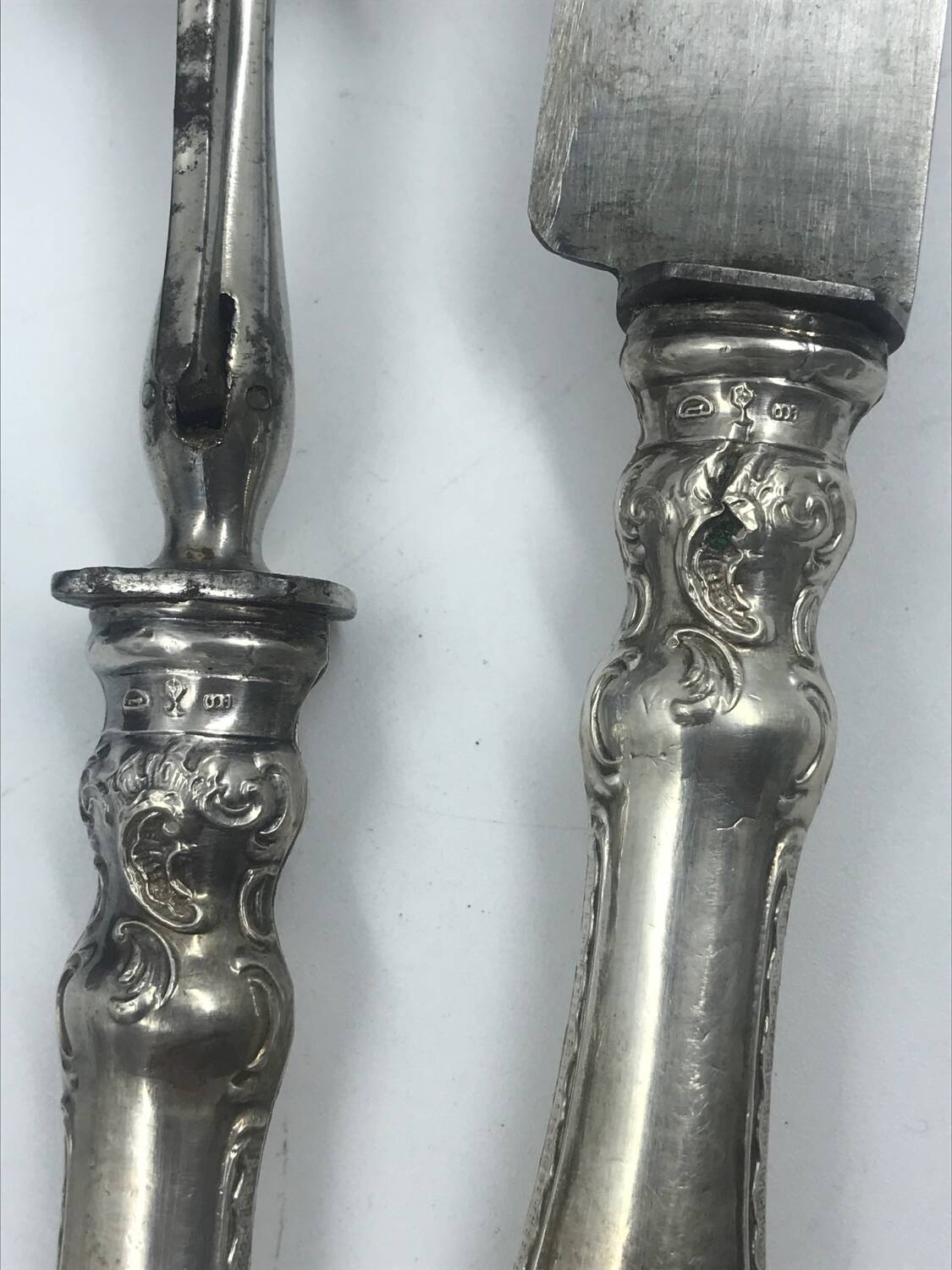 Antique silver-plated metal serving cutlery.