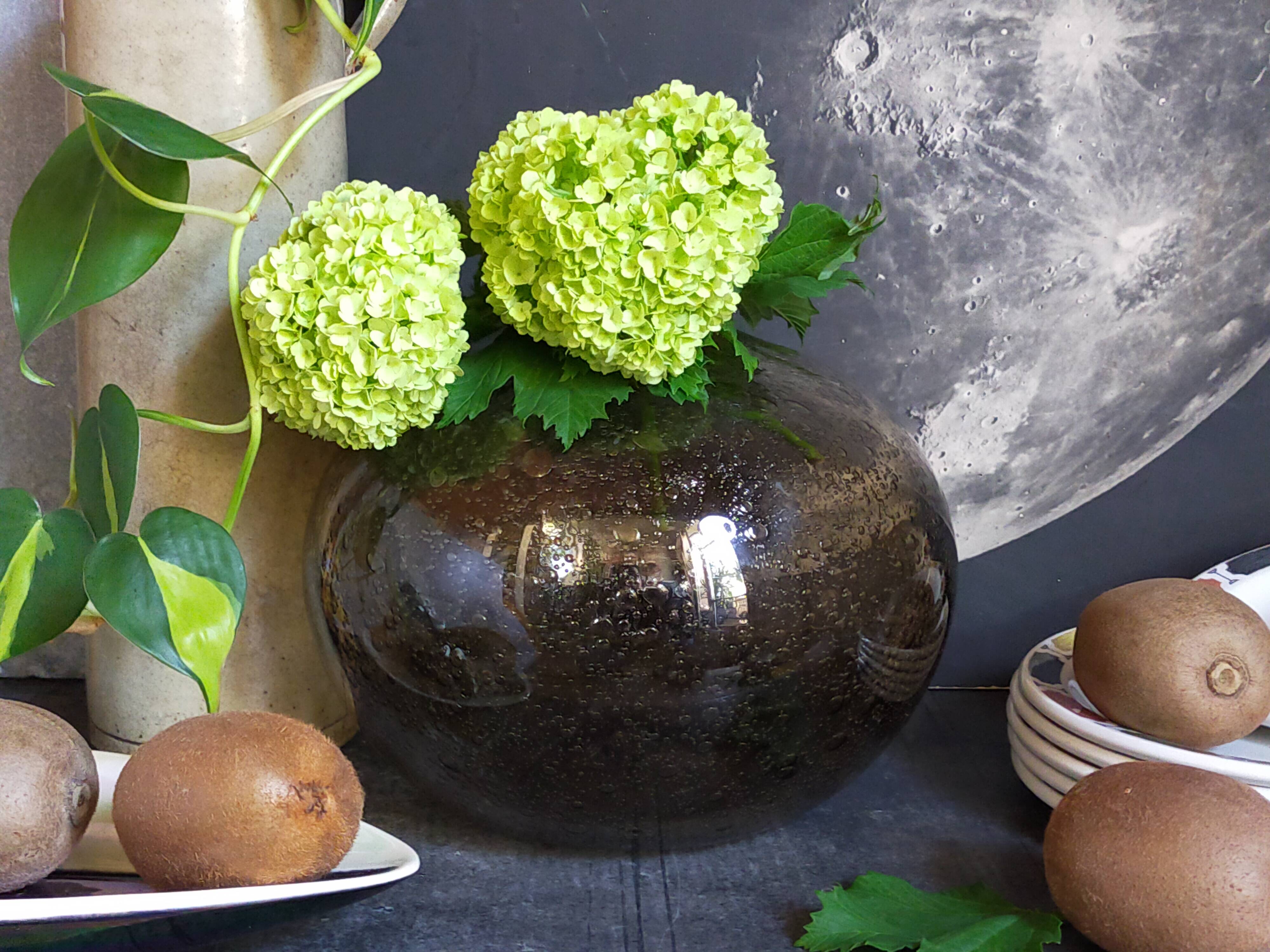 Vintage bubble-blown glass ball vase from riom france