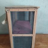 Wall-mounted pantry in vintage mesh wood